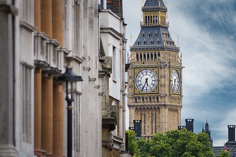 big ben by some buildings