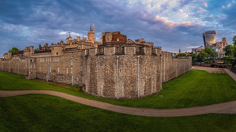 tower of london with the walkie talkie building in the background